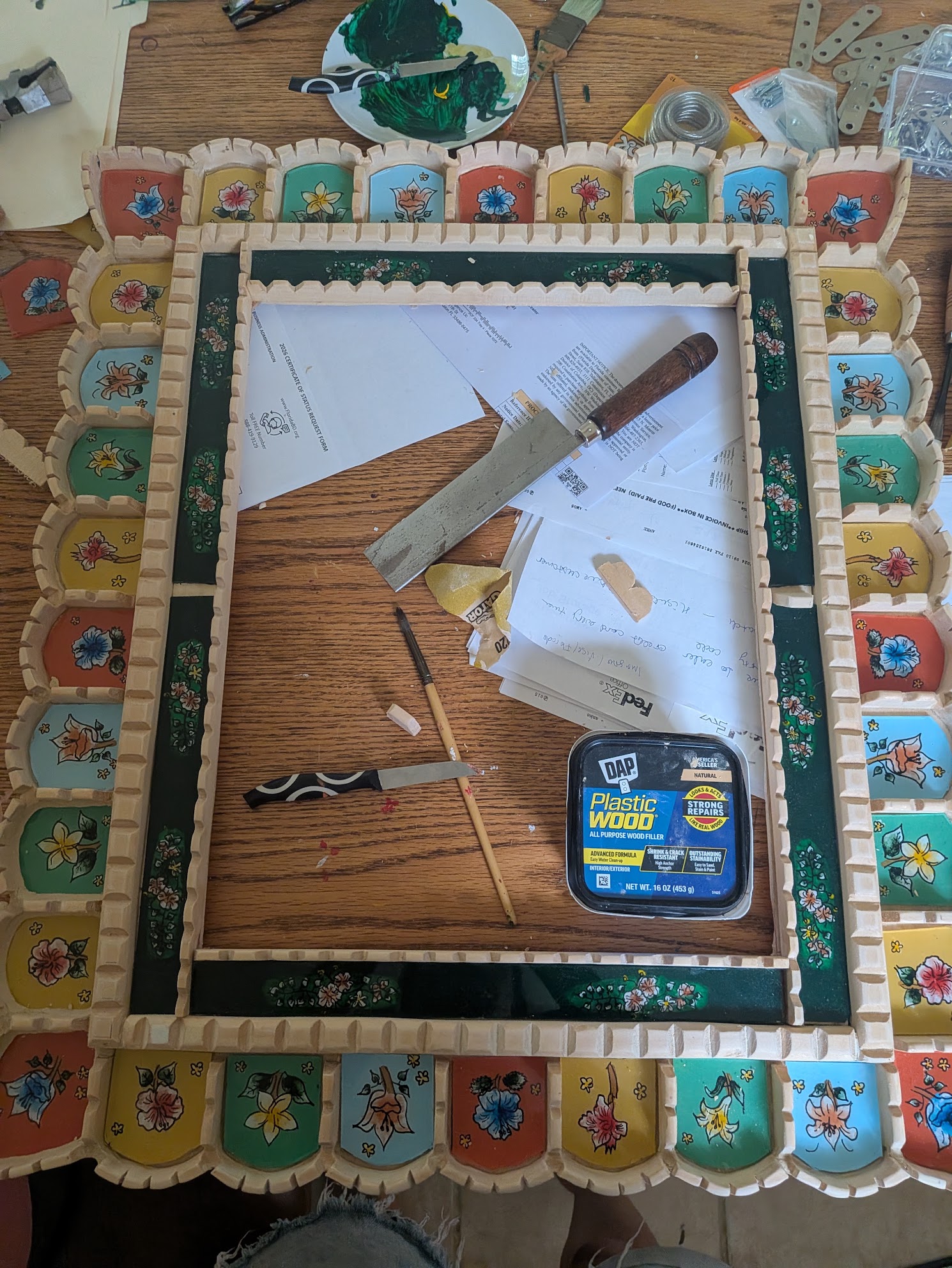 Fitting the mirror and backing in Ulviya Bemman's mirror-making process