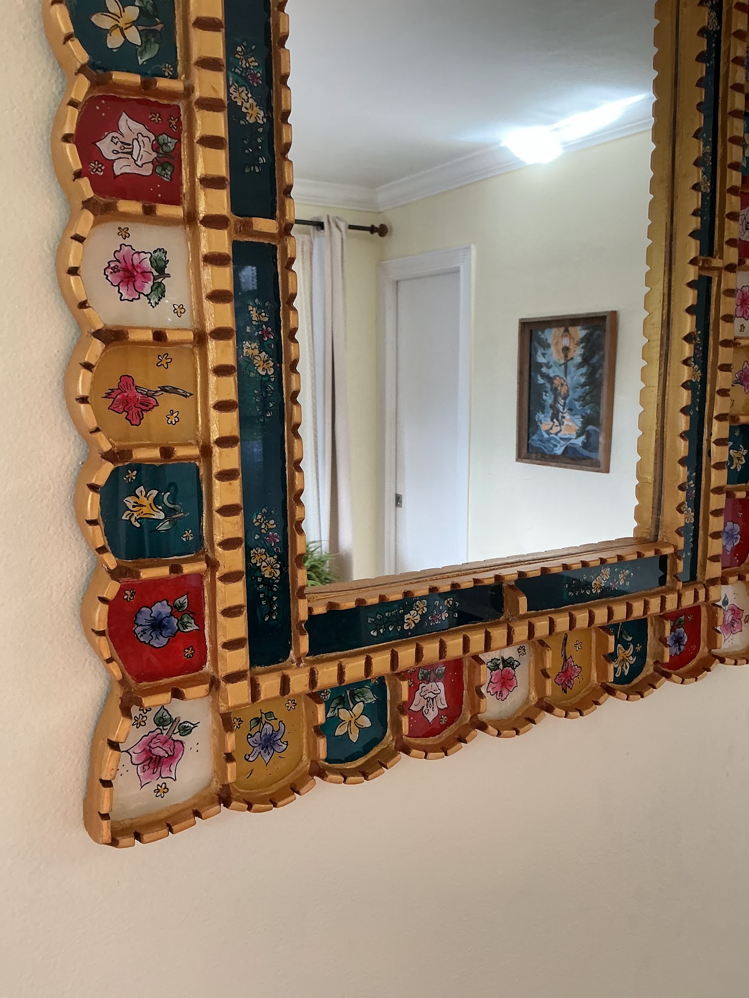Close-up of the lower corner and floral glass panels on Mediterranean Gold